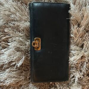 Chic Ferragamo Black Wallet with Gold Hardware